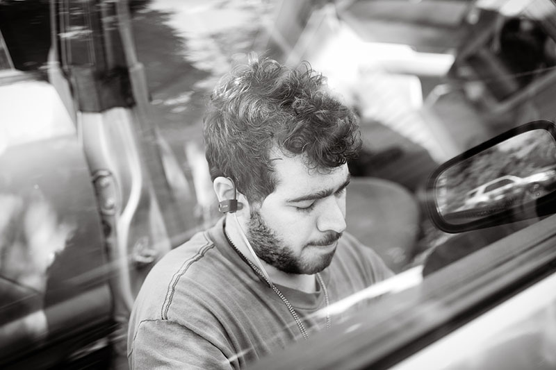 man fixing car portrait