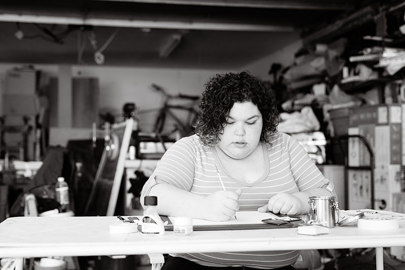 young woman creating art portrait