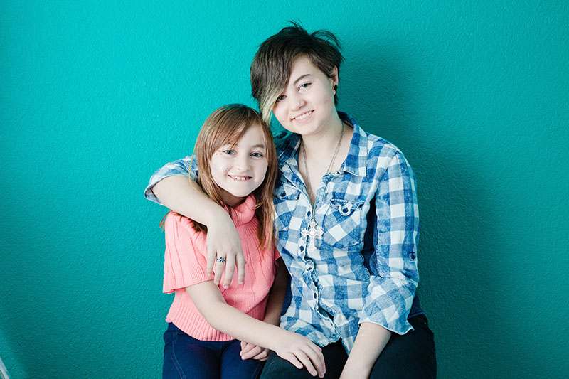 two sisters hugging portrait
