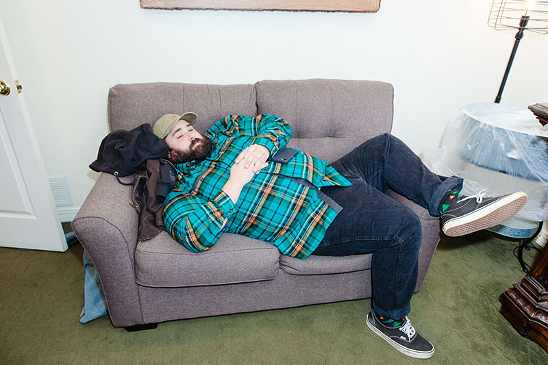 Hungover groomsmen on couch