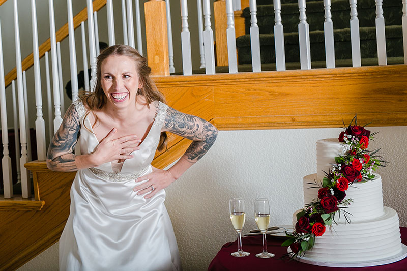 bride laughing at toast wedding